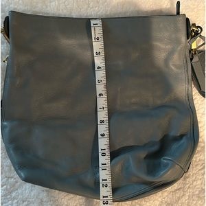 Brand new Fossil tote purse without tags. Never used. Smokey light blue color.